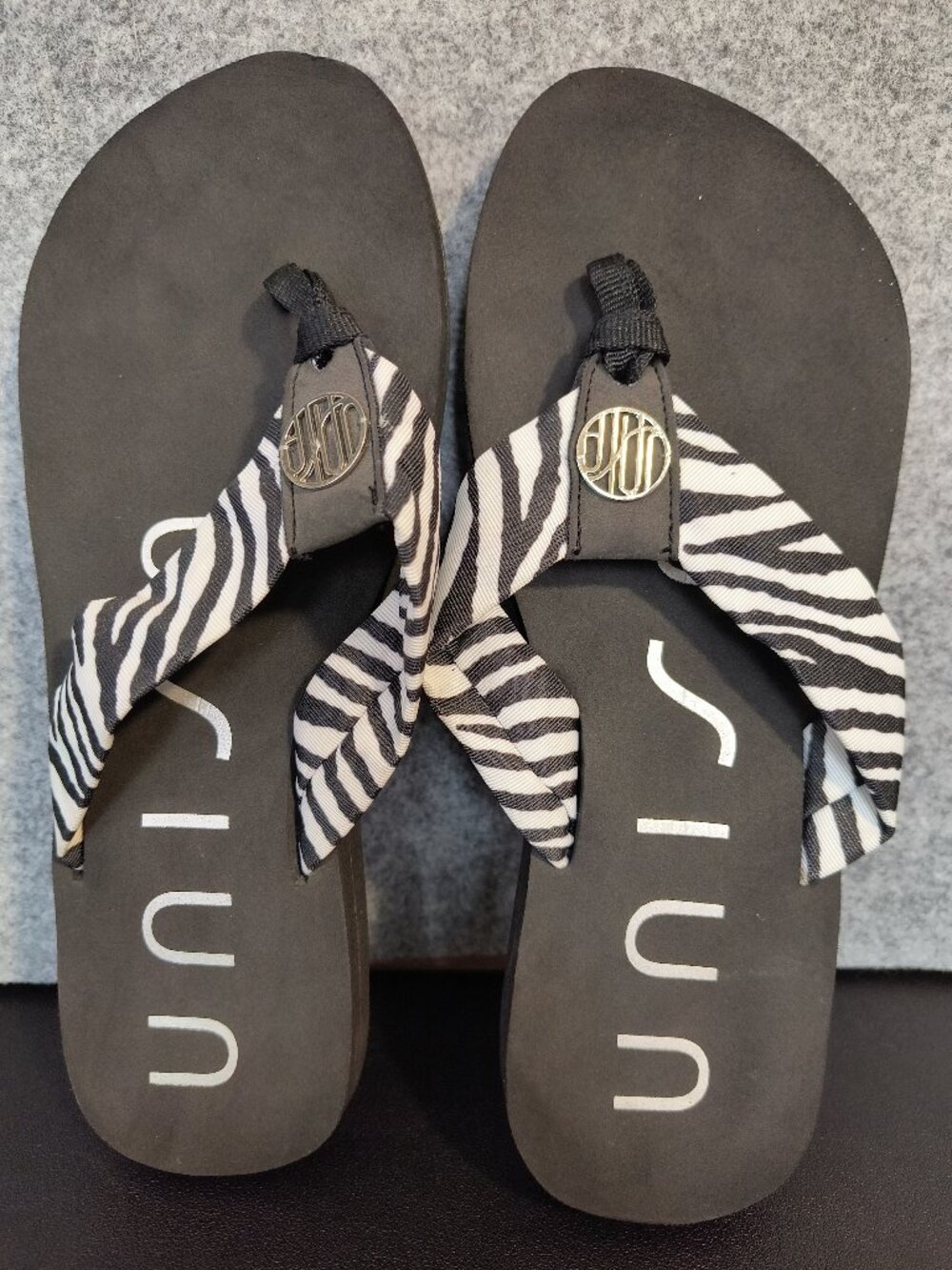 UNISA Women's Zebra Print Flip Flops Black White Silver Logo Thong No Size